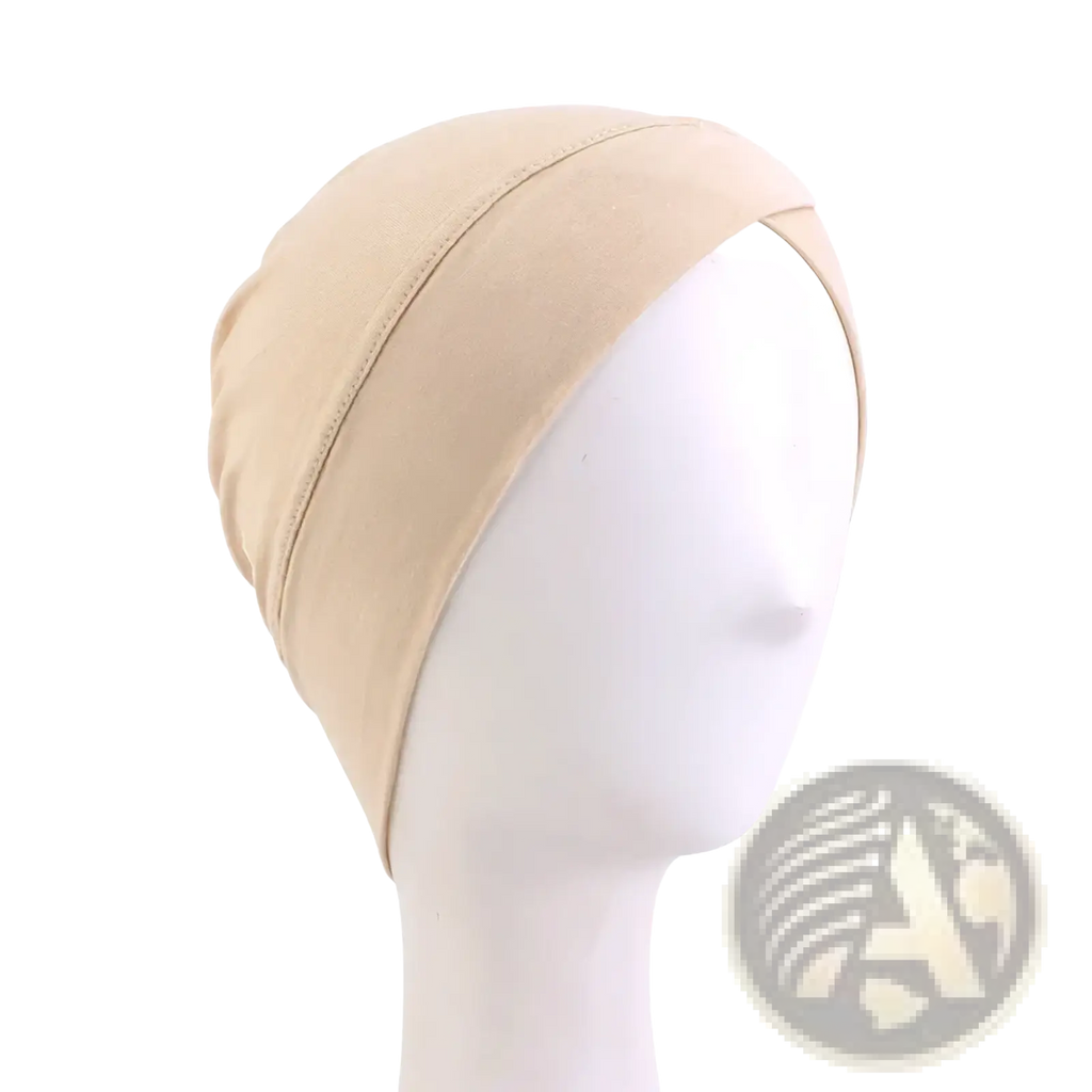 Beige modal cotton turban headwrap chemo cap with subtle seam detail made of stretchy fabric