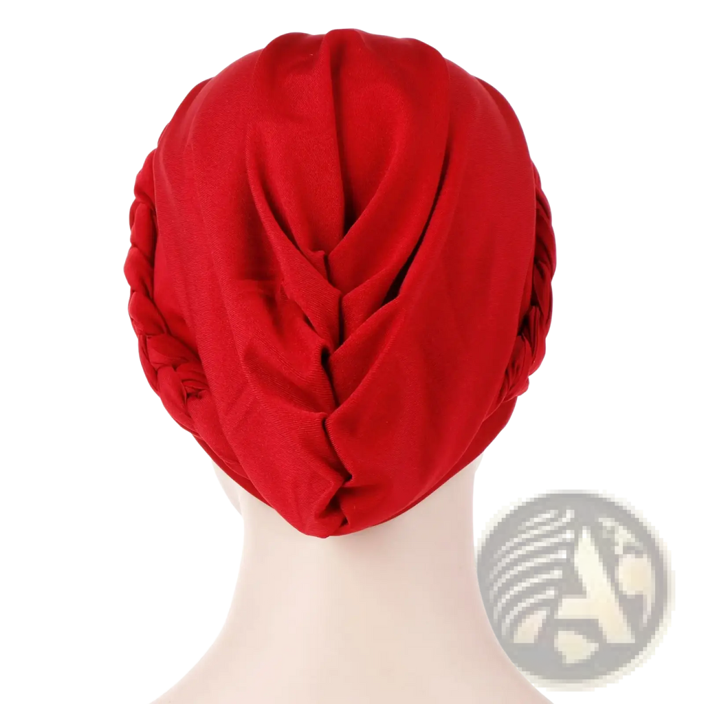 A vibrant red modal hijab turban with braided edge and soft folds designed as a braided head wrap