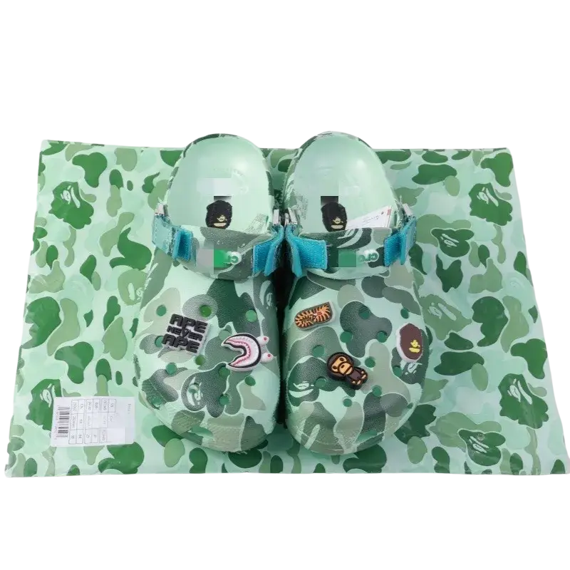 Mint green camouflage aape x crocs clogs with colorful character charms and blue straps for model toys gifts beach shoes