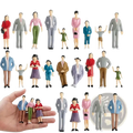 Set of 10 painted plastic miniature model train sitting passengers figurines in various outfits and poses including adults and children