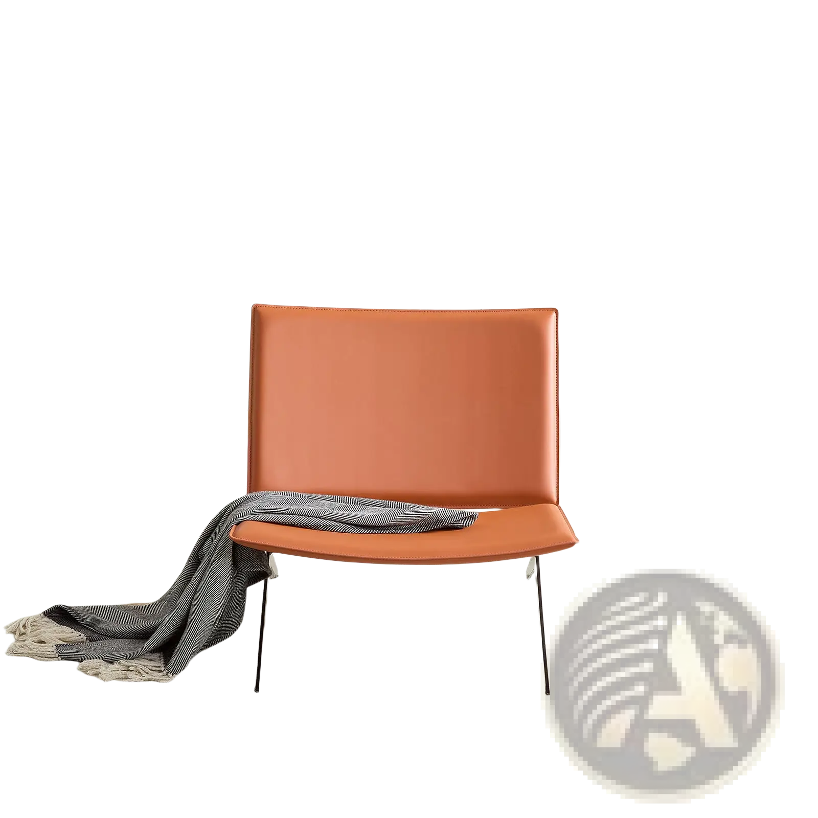 Modern accent chair in orange saddle leather with thin metal legs designed as a stylish lounge seating option