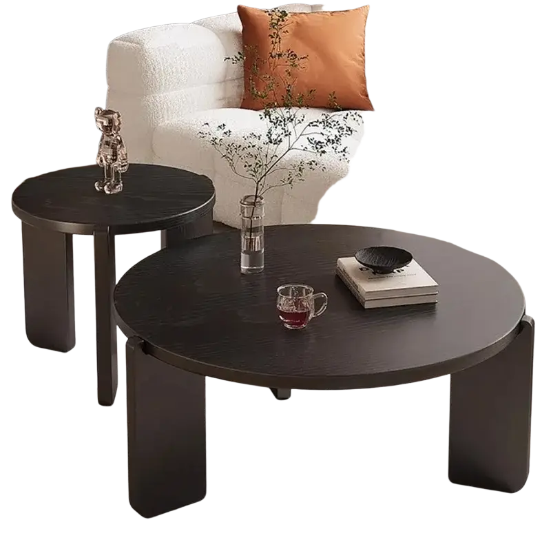 Modern black round coffee table with sleek minimalist legs showcasing key product selling points for stylish living