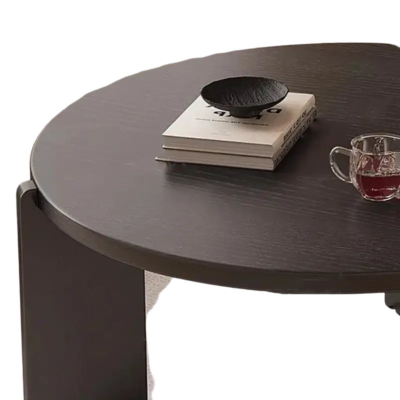 Modern black round coffee table with dark wood top and sleek minimalist legs ideal for stylish product selling