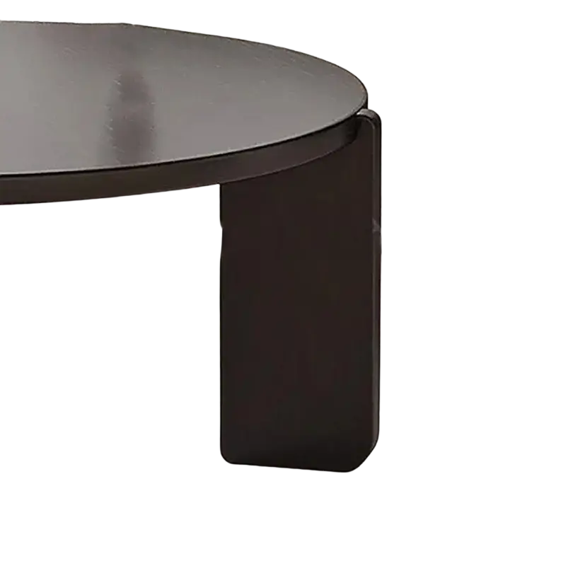 Modern black round coffee table with black matte finish, sleek minimalist design, and curved rectangular legs for product selling