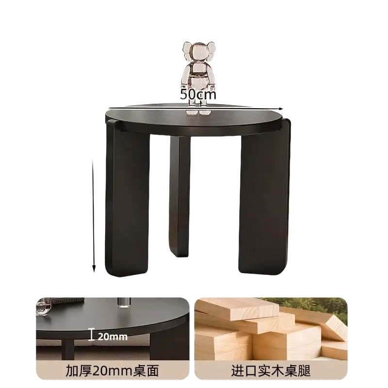 A sleek modern black round coffee table with a matte finish and sturdy imported wooden legs measuring 50cm
