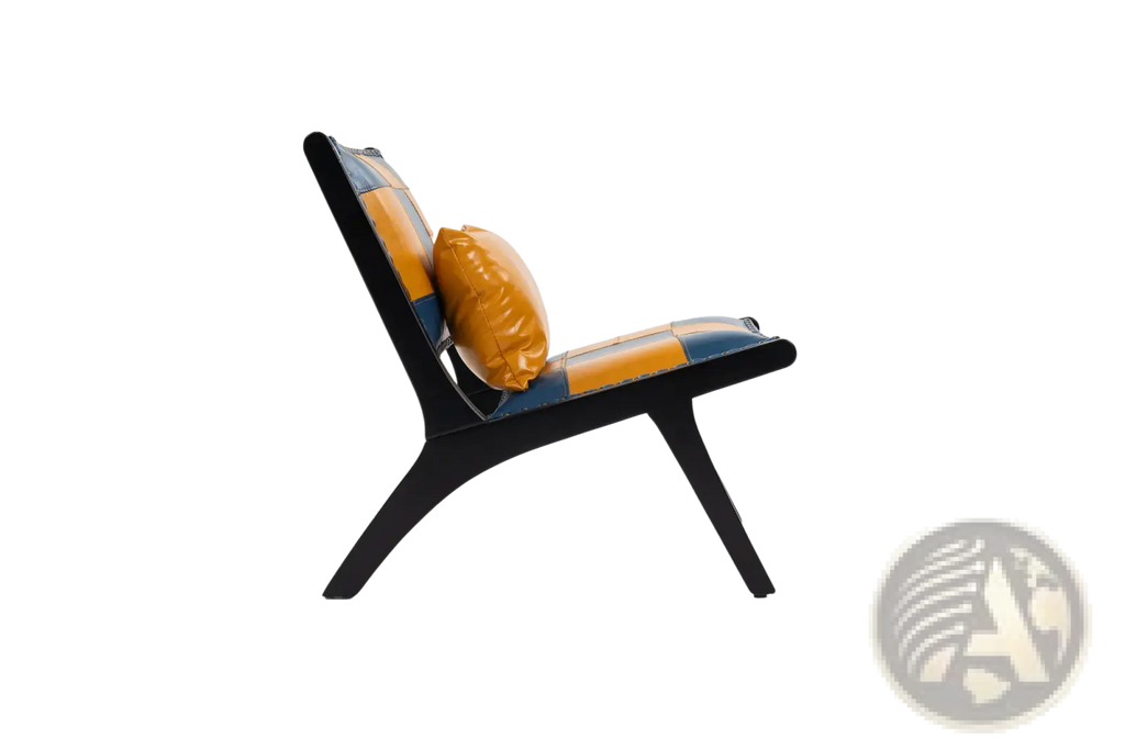 Modern boho accent chair with sleek black frame and vibrant orange and blue patchwork leather upholstery with orange cushion