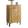 Modern light brown double door shoe cabinet with light wood finish arched panel doors and black metal legs