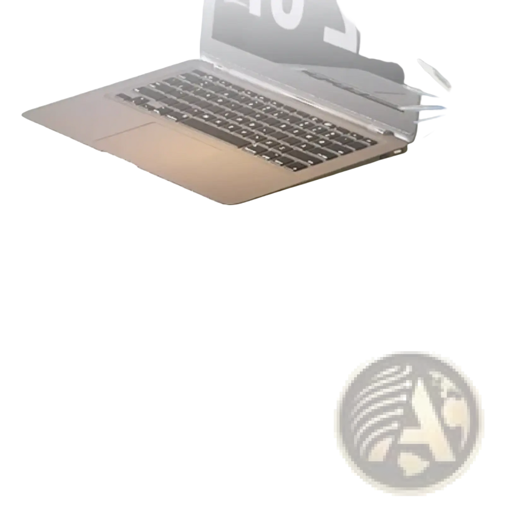 Silver laptop with black keyboard and trackpad on a reflective glass office desk with storage shelves
