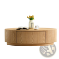 Light oak oval coffee table with storage drawer and subtle wood grain finish in modern luxury design