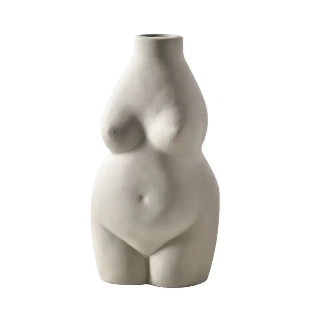 Modern minimalist female form ceramic art vase in off-white shaped like a stylized female torso