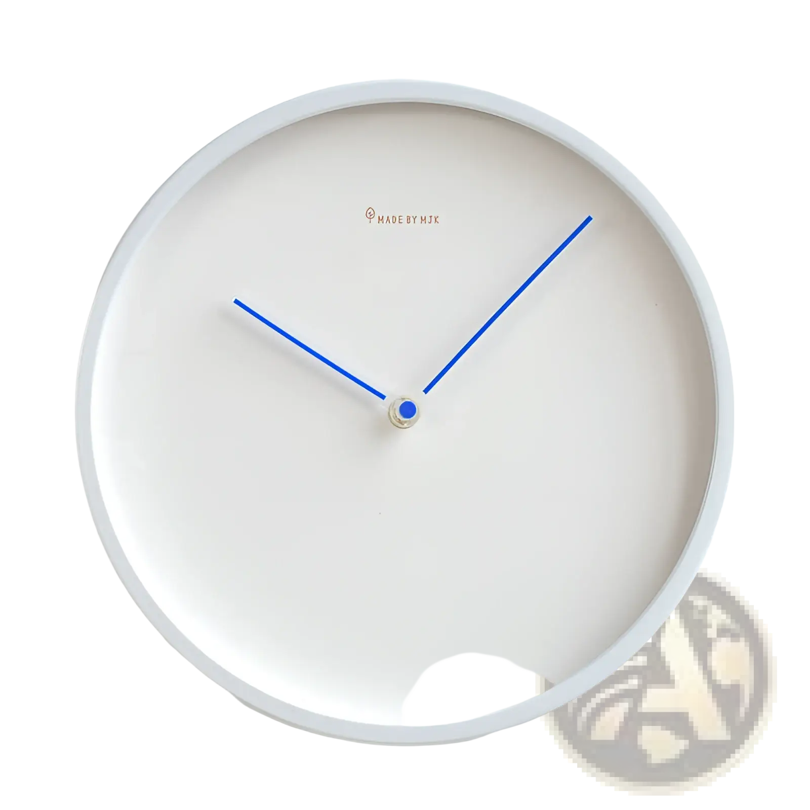 Modern minimalist metal wall clock with white face bold blue hands and silver center for living room use
