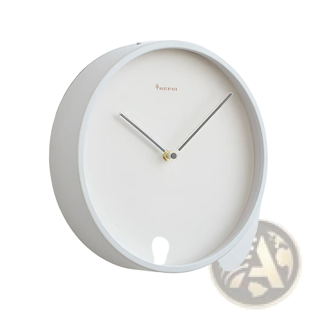 Modern minimalist metal wall clock with white face, slender silver hands, and gold-toned center for living room use