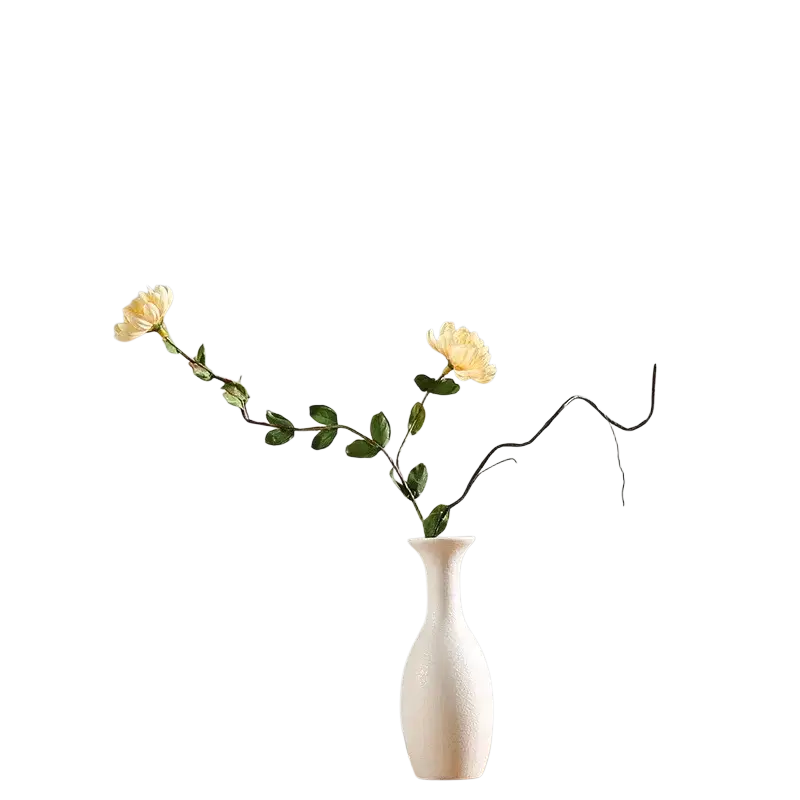 Modern white ceramic vase with slender neck and rounded body holding two yellow flowers for floral decor