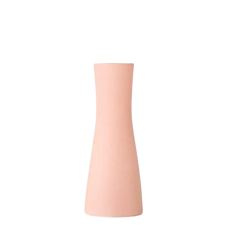A sleek matte-finish pink ceramic vase with a slender hourglass silhouette for modern white ceramic floral decor