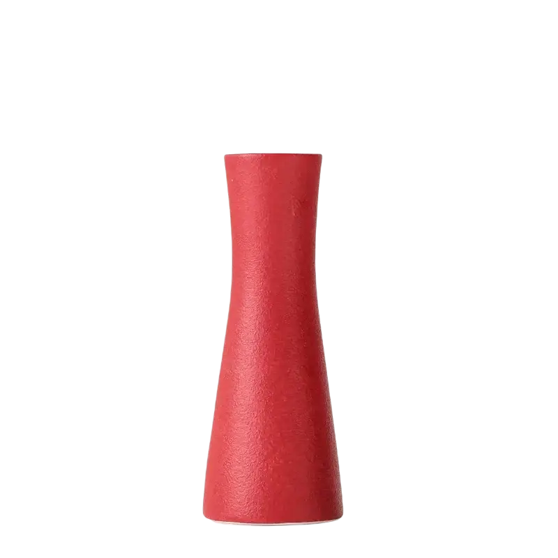 A modern white ceramic vase for floral decor with a sleek matte red finish and tapered base