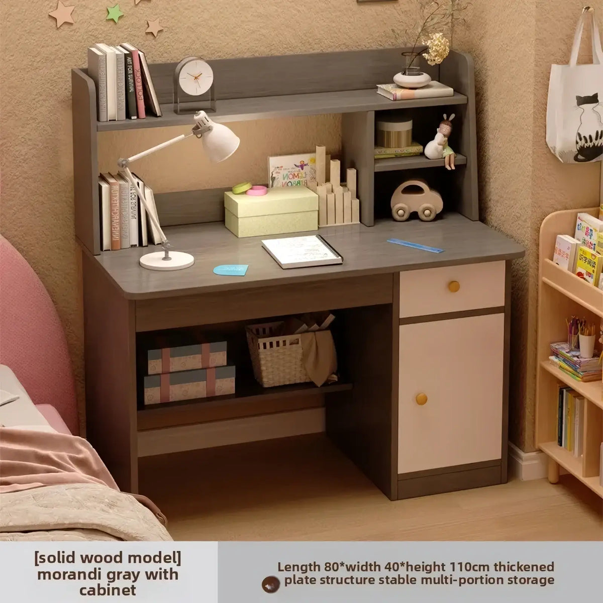 Modern wood student computer desk with integrated bookshelf featuring a gray wooden top and light pink drawers