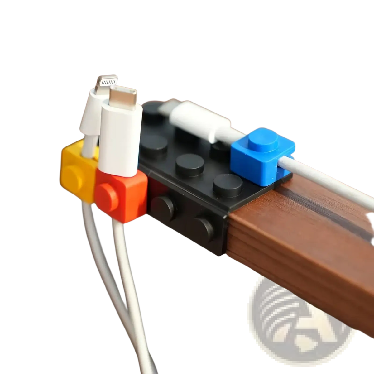 Modular brick cable organizer 2 sets with black and colorful lego-style bricks holding white charging cables