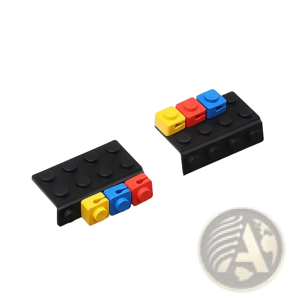 Black plastic lego-style table edge clips with yellow red and blue interlocking brick attachments modular brick cable organizer