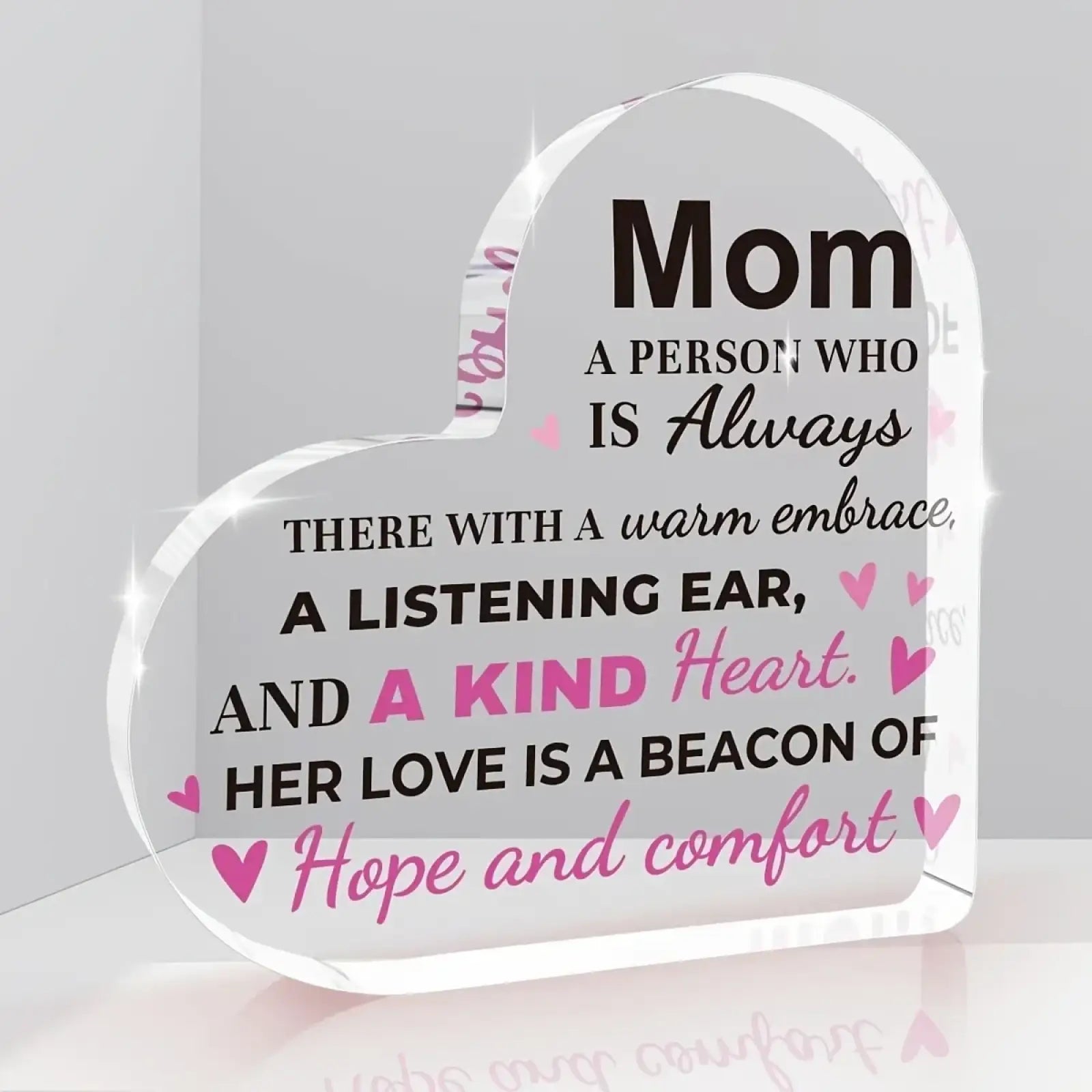 Clear heart-shaped acrylic mom keepsake plaque with engraved black and pink text and pink heart accents