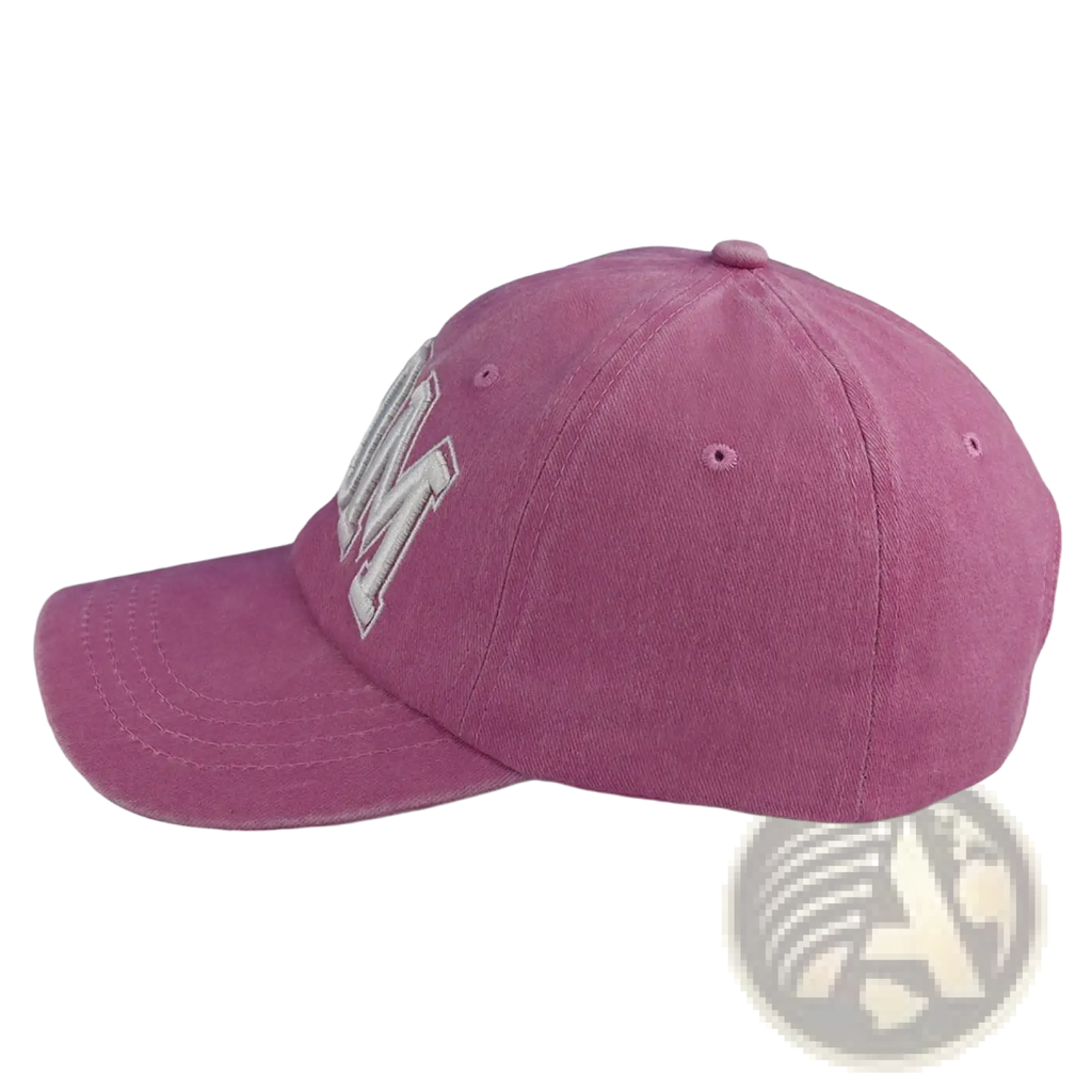 A dusty rose baseball cap with a faded white embroidered m logo in the mom and dad baseball hat set for couples
