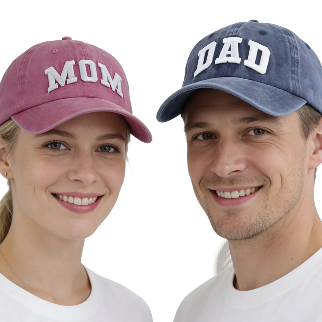 A pair of faded denim mom and dad baseball hats with white embroidered lettering for couples