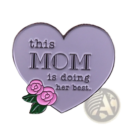 A silver heart-shaped enamel pin with pink roses and the inscription this mom is doing her best for mothers