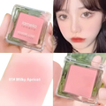 Monochrome Powder Blush Compact with brush showing pink powder in shade 01 milky apricot by lomella in clear compact