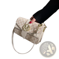 Cream-colored monogram letter print crossbody messenger bag with adjustable strap and gold-tone hardware