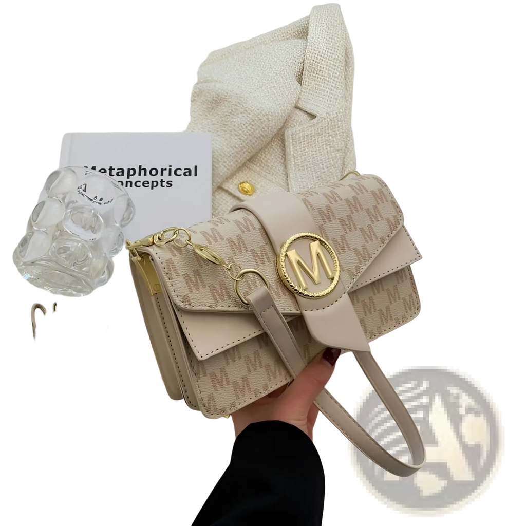 Beige monogram letter print crossbody messenger bag with repeating pattern gold-tone hardware and adjustable strap