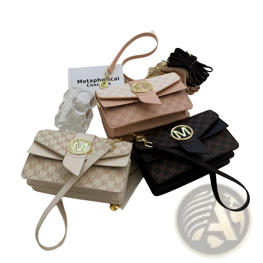 Three small monogram letter print crossbody messenger bags in beige, pink, and black with gold logo clasps