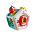 Montessori busy cube travel toy with a white hexagonal sensory cube featuring colorful animal figures and a red door labeled door
