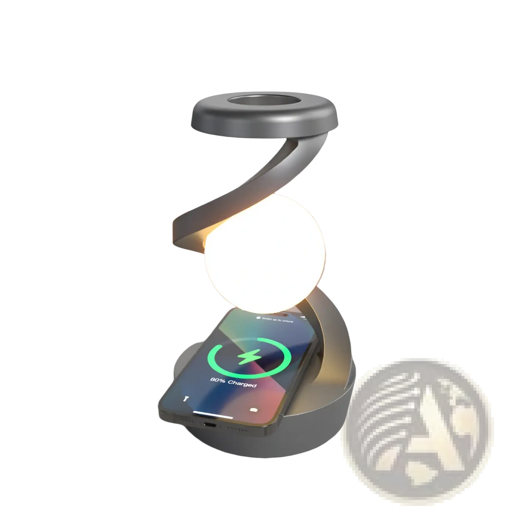 Silver spiral moon desk lamp with integrated wireless charging pad and glowing spherical light for sensor control