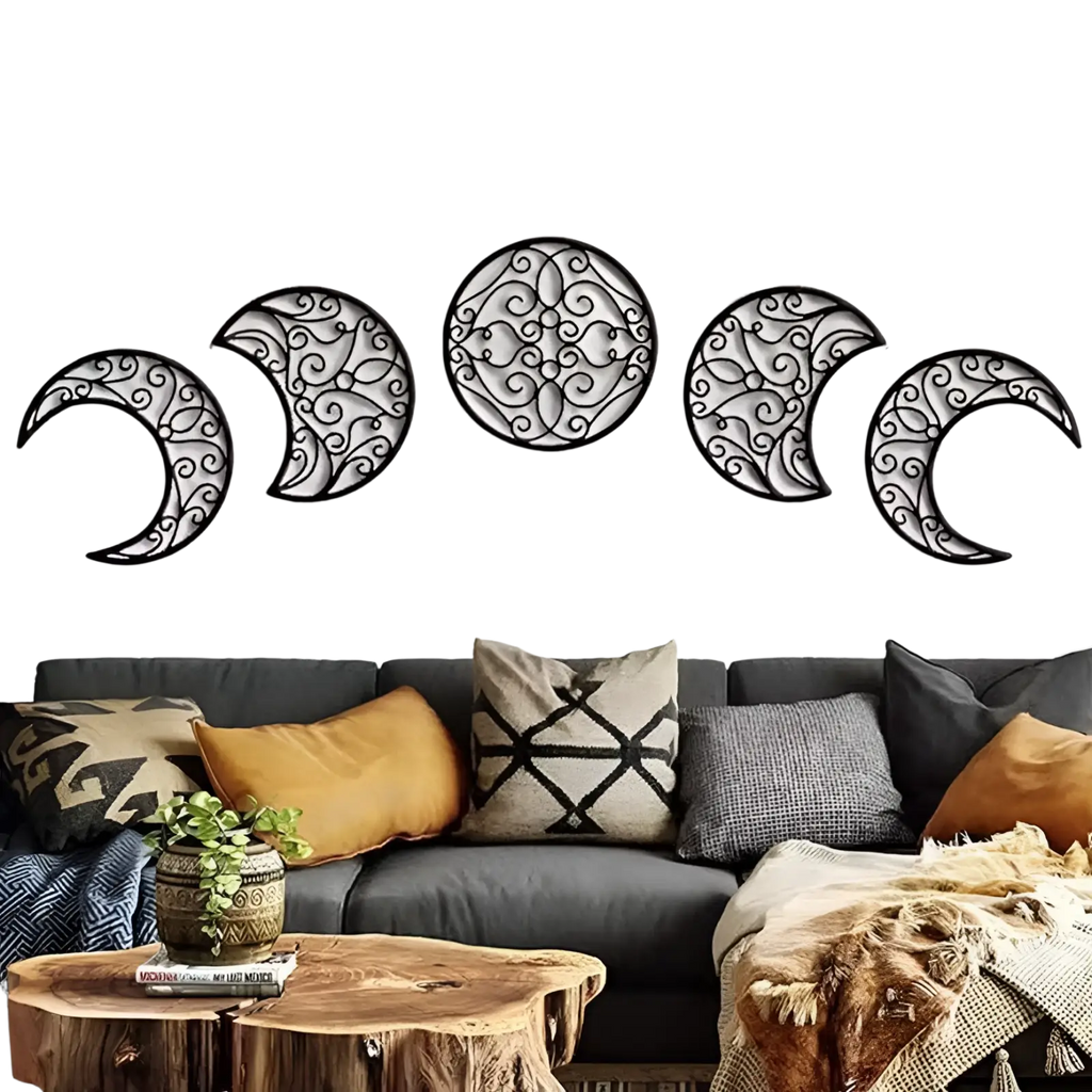 Black wrought iron moon phase wall art with five pieces and intricate swirling patterns in black metal decor