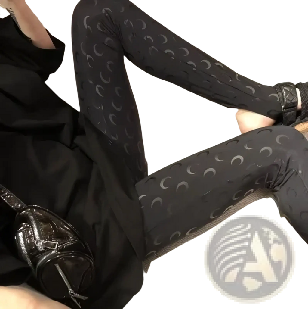 Black high waist leggings with a subtle silver crescent moon print perfect for casual or athletic wear