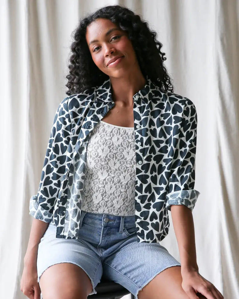 Black and white heart-patterned cotton button up blouse with rolled sleeves from More Love Giraffe collection