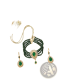 Emerald green beaded bracelet set with central teardrop gemstone and gold tone accents from Moroccan bridal jewelry set