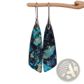 Teardrop-shaped mosaic geometric stone flower drop earrings with vibrant blue and black marbled stone and silver hooks