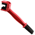 Red plastic motorcycle chain brush cleaner with dual sided black bristles for effective chain maintenance
