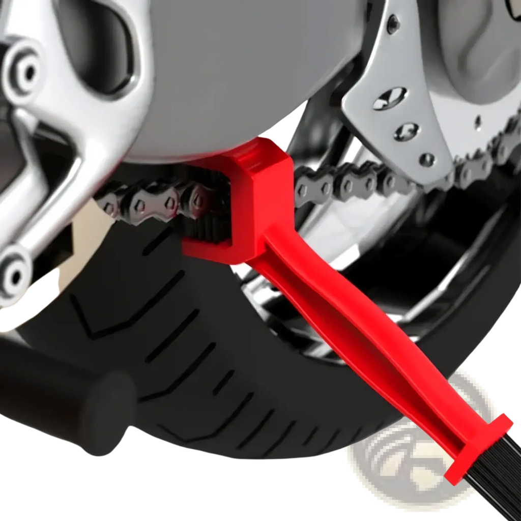 Motorcycle chain brush cleaner dual sided tool with red plastic handle and black bristles for motorcycle maintenance