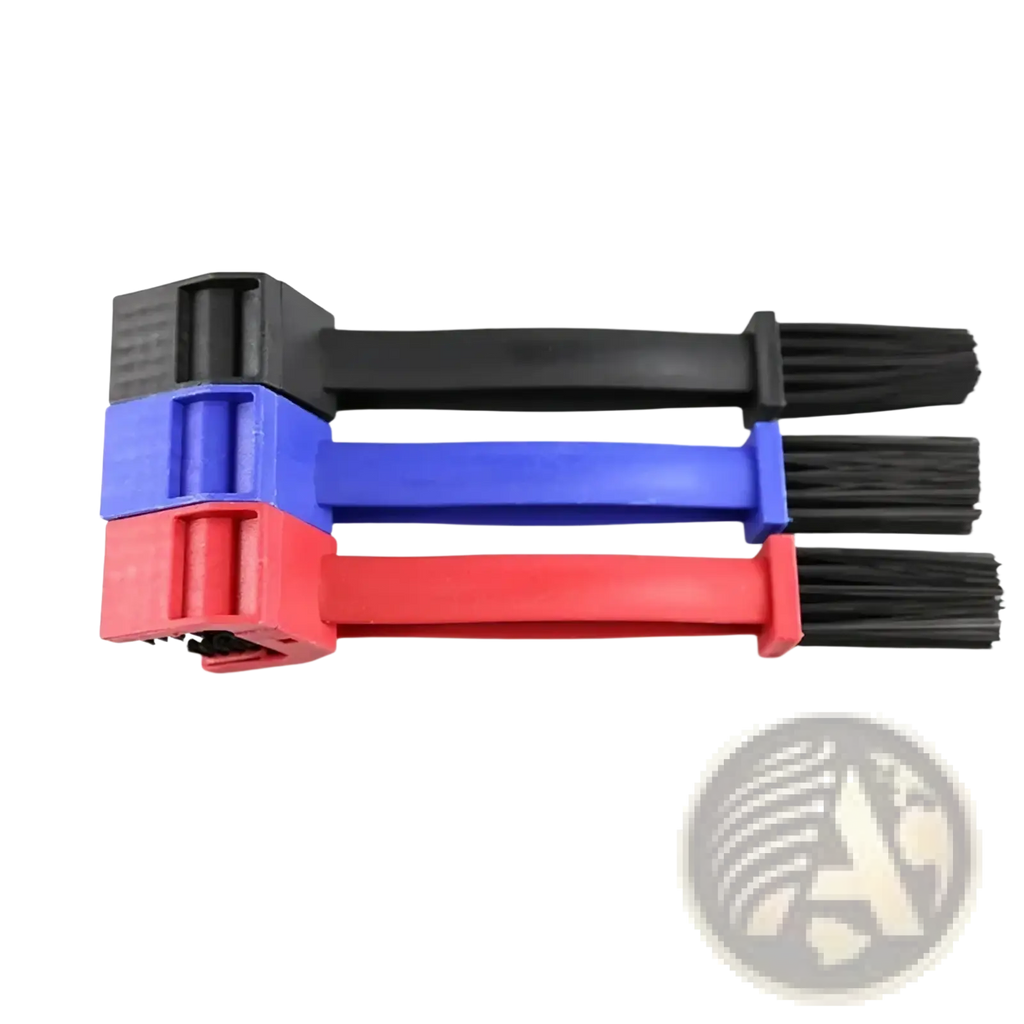 Three plastic-handled motorcycle chain brush cleaners with black bristles in red blue and black handles for dual-sided cleaning