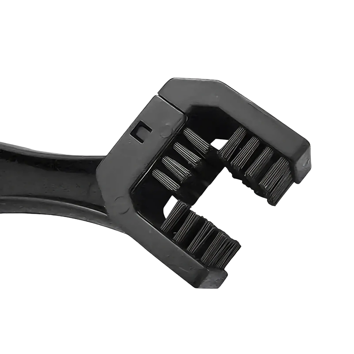 Black plastic motorcycle chain brush cleaner tool with dual-sided bristles for efficient chain cleaning