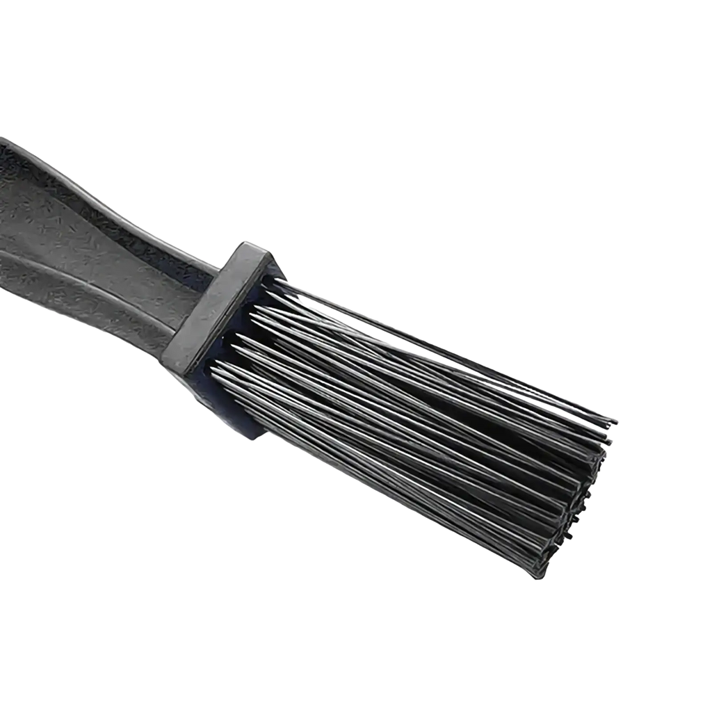 Black plastic motorcycle chain brush cleaner tool with dense fine bristles for precise cleaning and maintenance