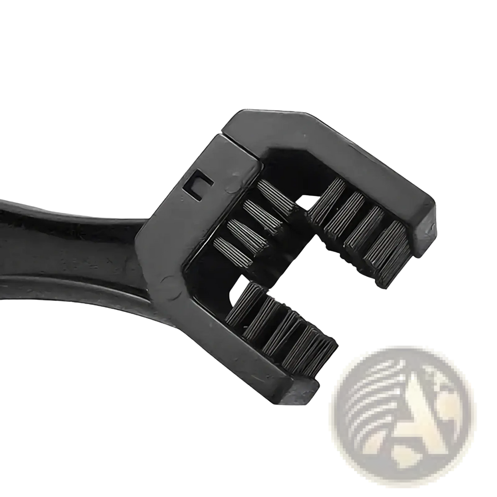 Black plastic motorcycle chain brush cleaner tool with dual-sided bristles for efficient chain cleaning
