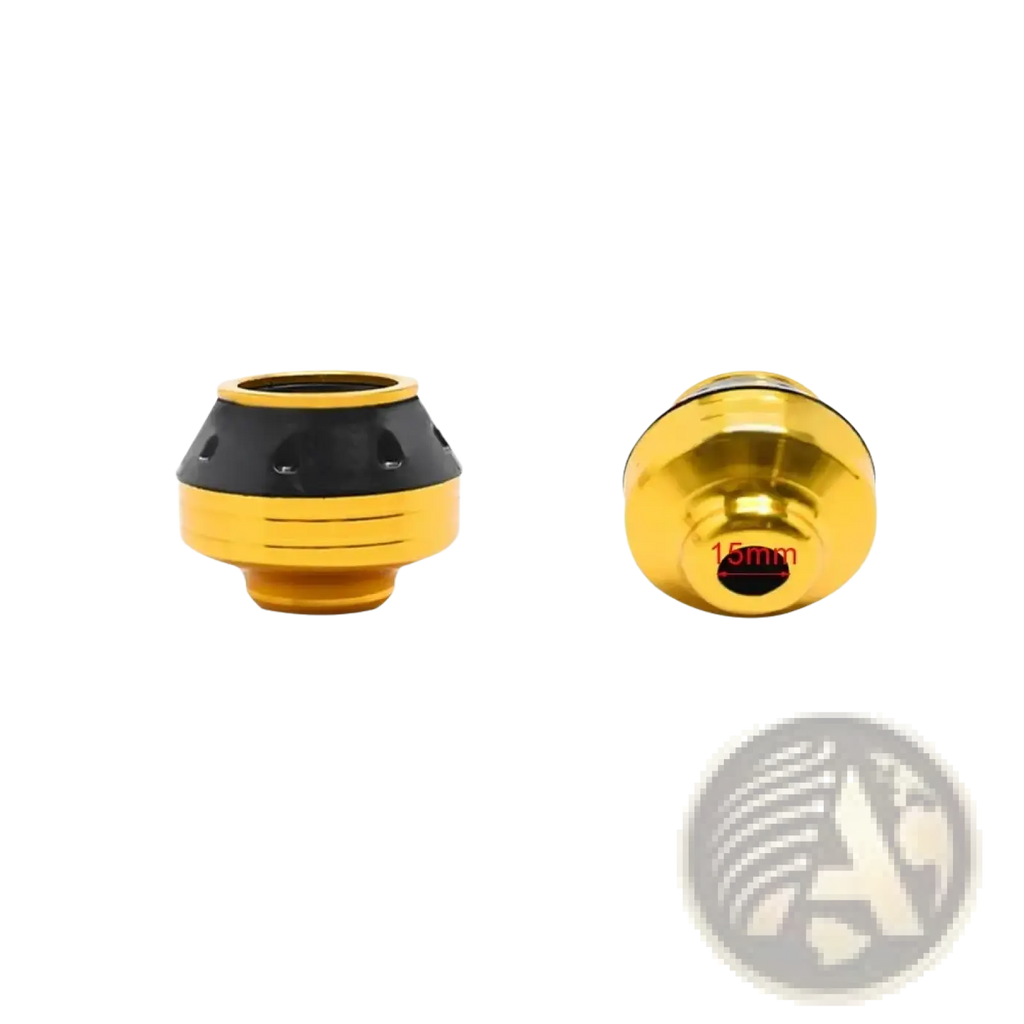 Motorcycle fork sliders anti crash protectors in gold and black with a sleek cylindrical design and ventilation slots