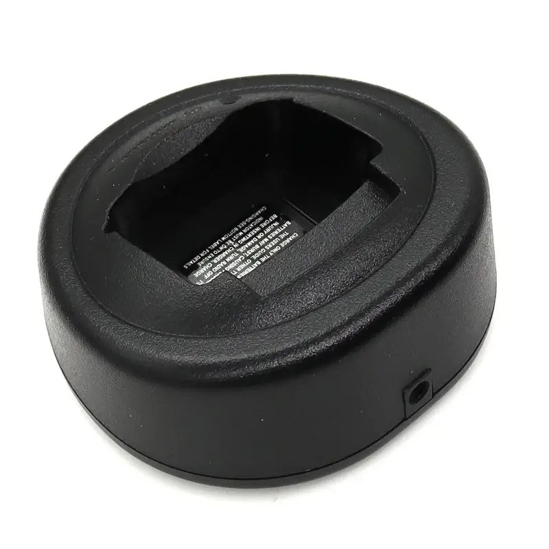 Black plastic desktop charger base for motorola walkie talkie gp328 ht750 shown from the back side