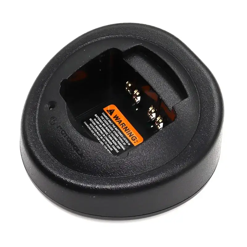 Black motorola walkie talkie desktop charger base for gp328 ht750 with metallic contacts and warning label visible