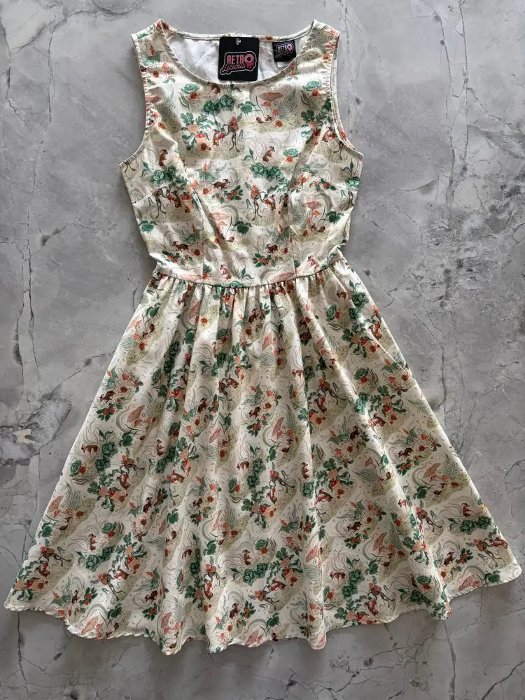 Vintage mouse print sleeveless a-line midi dress in cream cotton with pink and green floral pattern and pockets