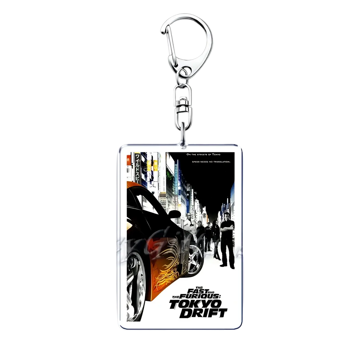 Rectangular acrylic keychain featuring a black and orange car with flame decals from The Fast and the Furious Tokyo Drift poster