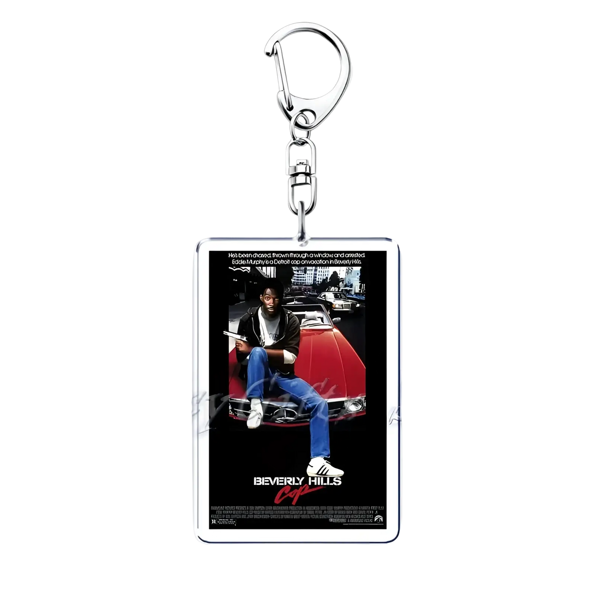 Rectangular acrylic movie poster keychain featuring beverly hills cop design with silver edges on black background