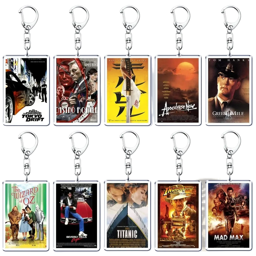 Set of ten rectangular acrylic movie poster keychains featuring colorful iconic film artwork for collectors